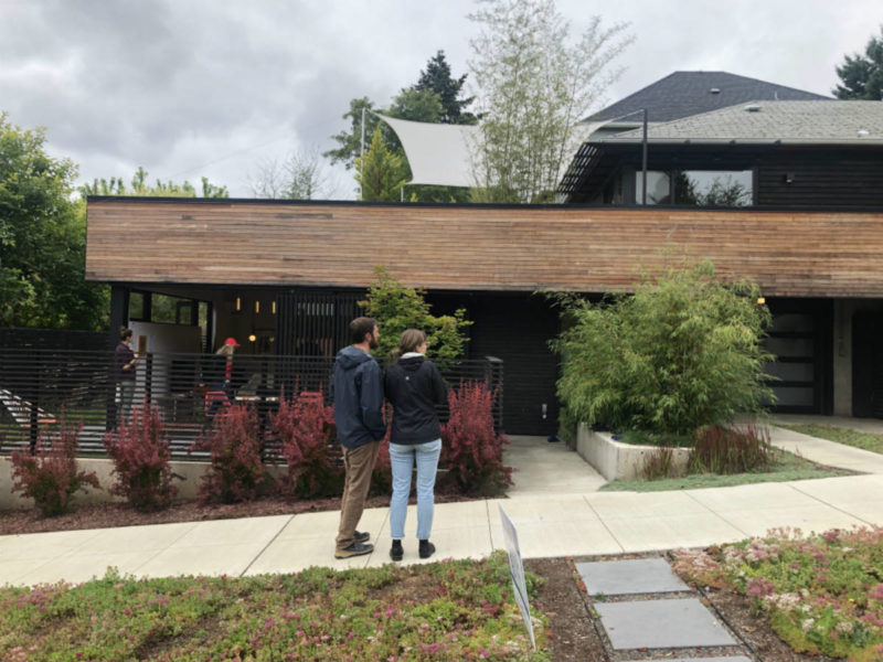 Couple attends open house for home with ADU in Seattle